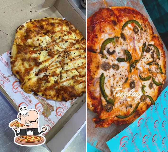 Pick pizza at Mir's Grills N Garlics