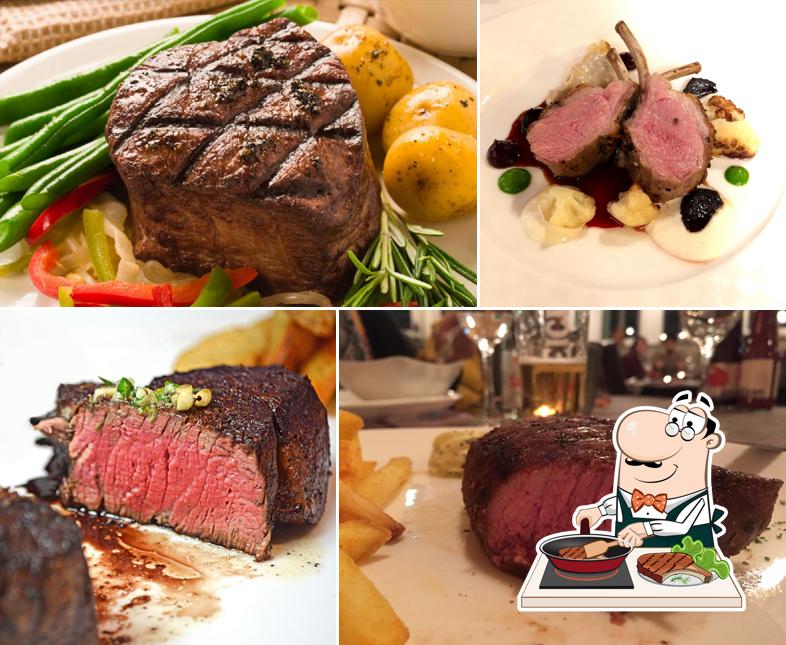 Prenditi i un pasto a base di carne a Restaurant RICO'S