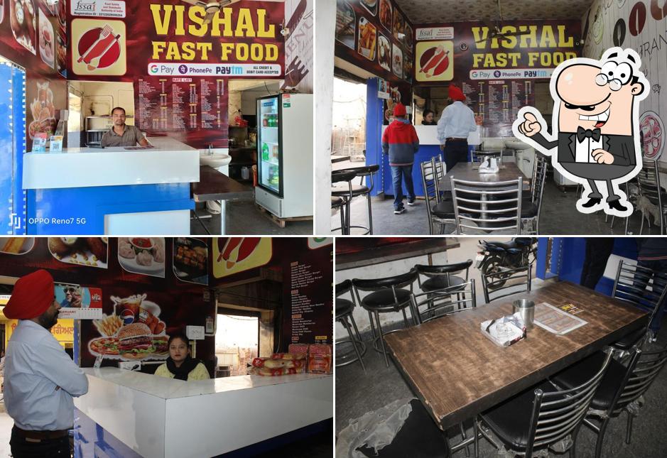 Take a seat at one of the tables at Vishal Fast food Top Fast Food Shop, Restaurants, Veg Restaurants