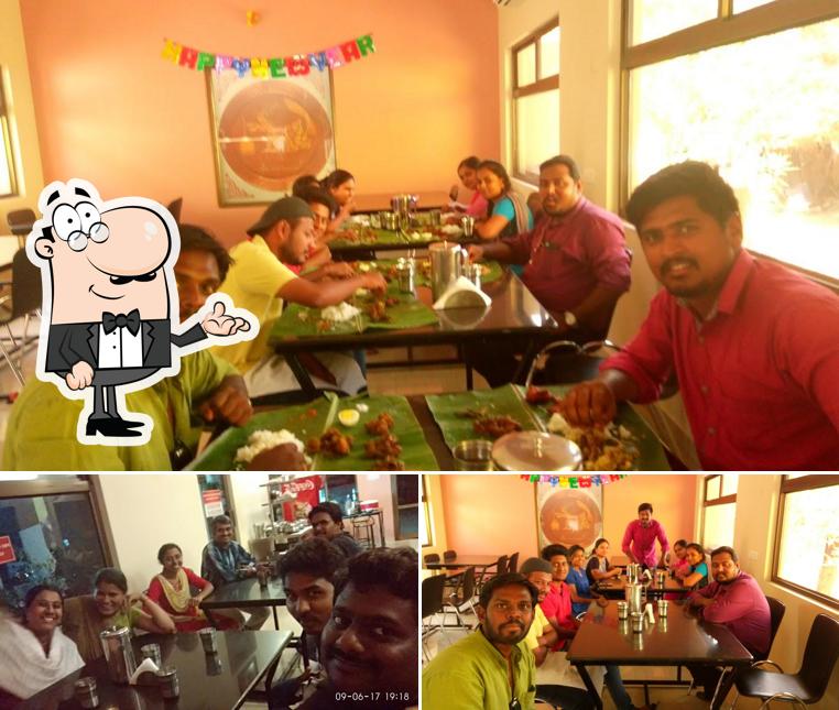 Take a seat at one of the tables at NANJAI RESTAURANT