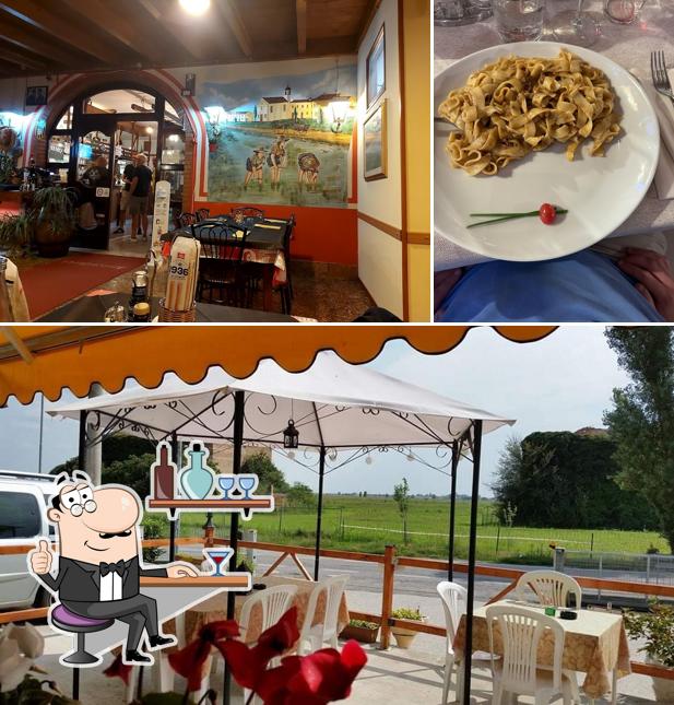La foto di interni e bevanda da Trattoria Dai Zemei Snc Di Giacomello Francesco E C