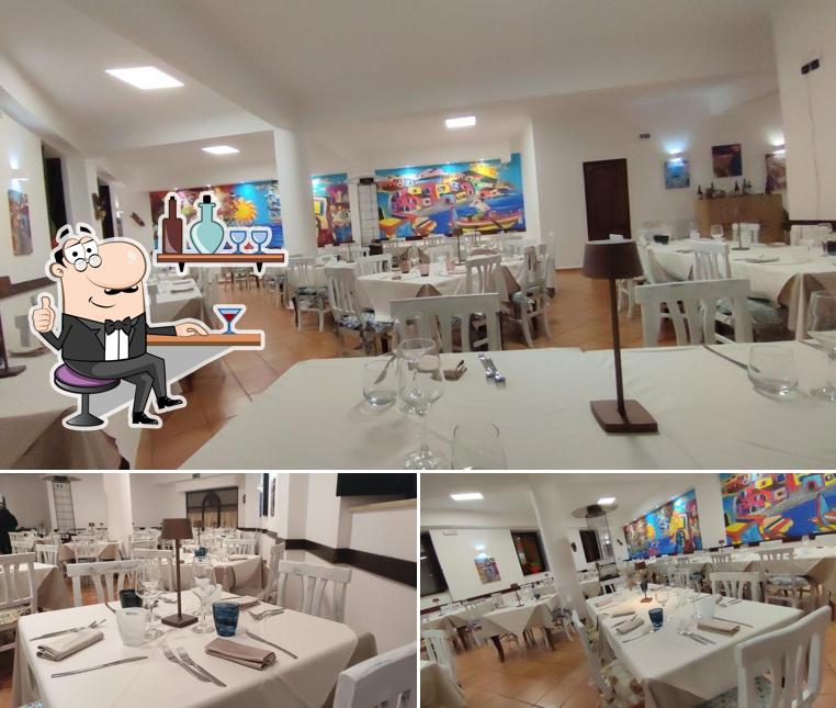 Siediti a un tavolo di La Taverna Ristorante