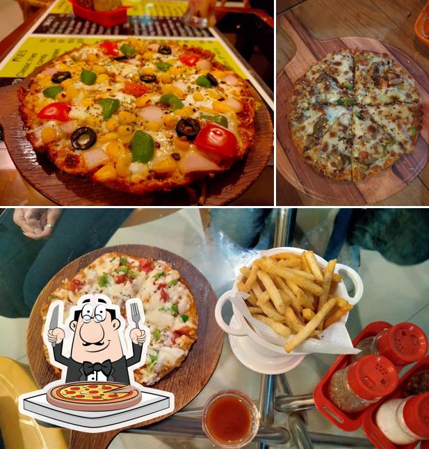 Get pizza at Rainbow Cafe