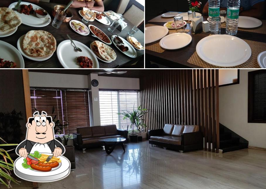 The photo of Hotel Maharaja Executive Restaurant & Lodge’s food and interior