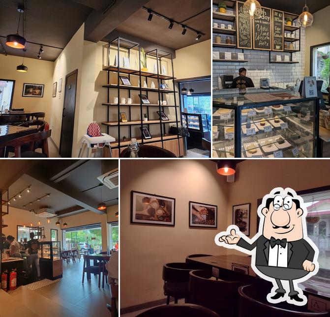 Take a seat at one of the tables at 8th Day Cafe & Bakery