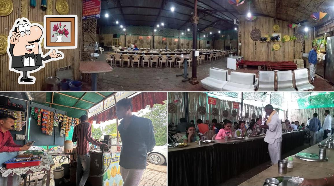 Take a seat at one of the tables at Shree Govindam Restaurant