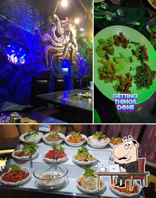 Take a seat at one of the tables at Jungle Barbeque
