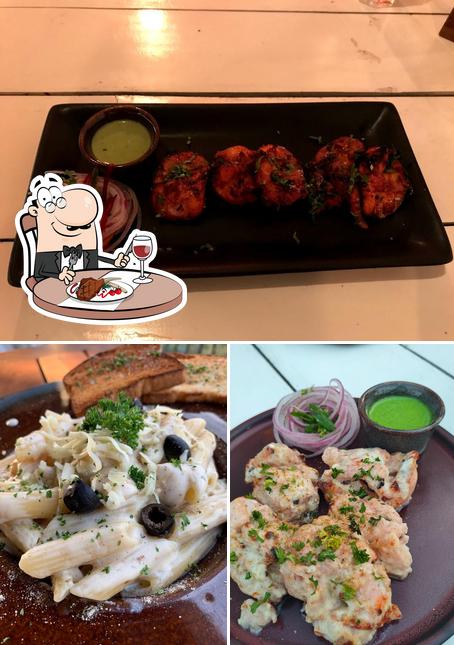 Moonshine Cafe and Bar, Hauz Khas Village offers meat dishes
