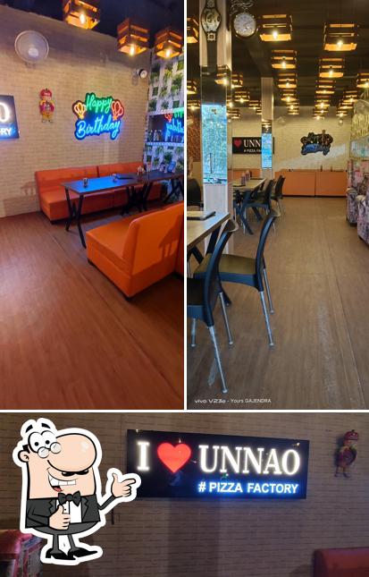 Look at the photo of PIZZA FACTORY