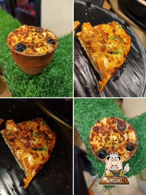 Get pizza at Al Junaid Shawarma