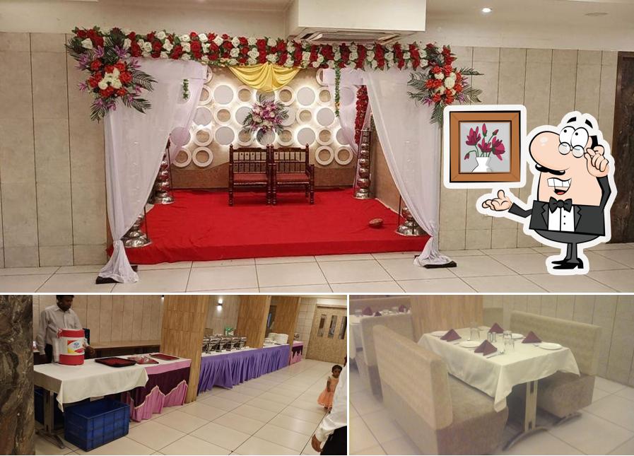Take a seat at one of the tables at Red Apple Restaurant & Banquet