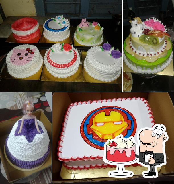 Here's a picture of CELEBRATION (DESIGNER CAKE & MOULDED CHOCOLATE )