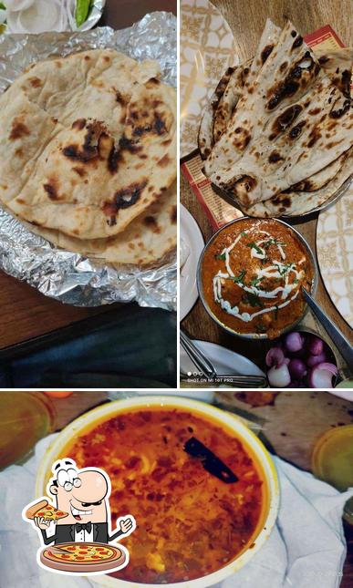 Try out pizza at Ramesh Dhaba & Chinar Sweets