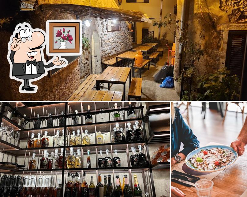 Questa è la foto che presenta la interni e bevanda di Trattoria Mandrać