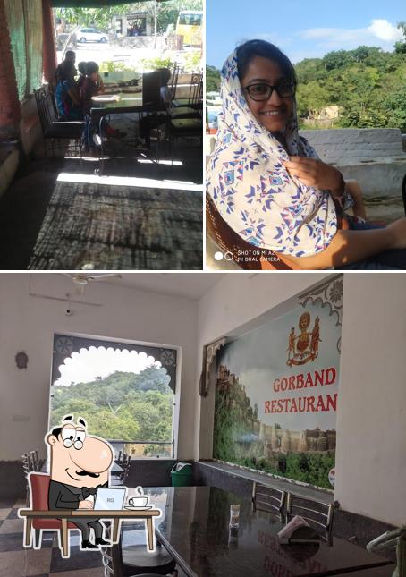 The image of interior and dining table at Gorbandh Veg Restaurant
