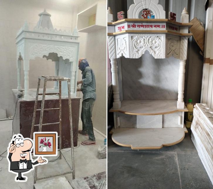 Take a seat at one of the tables at Hotel TuljaBhavani