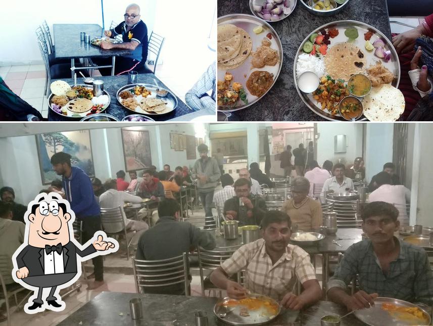 The picture of interior and food at Ashapura Dining Hall Mundra