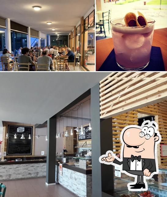 Dai un'occhiata agli interni di Guacci Pizza & Food