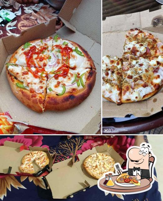 Get pizza at New Pizza Delight