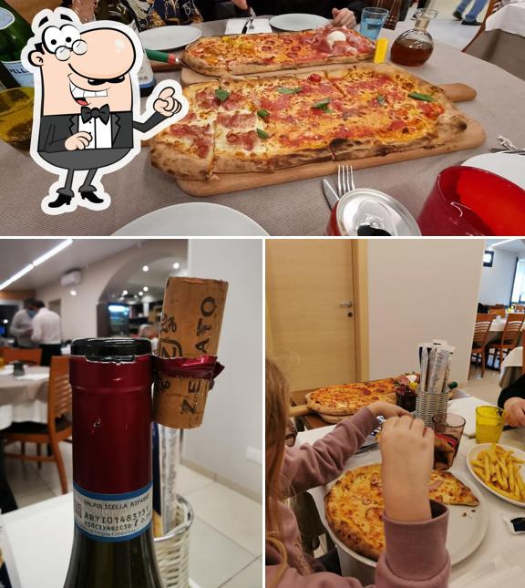 La foto della interni e pizza di Pizzeria Bella Napoli di Borgo Roma - Verona