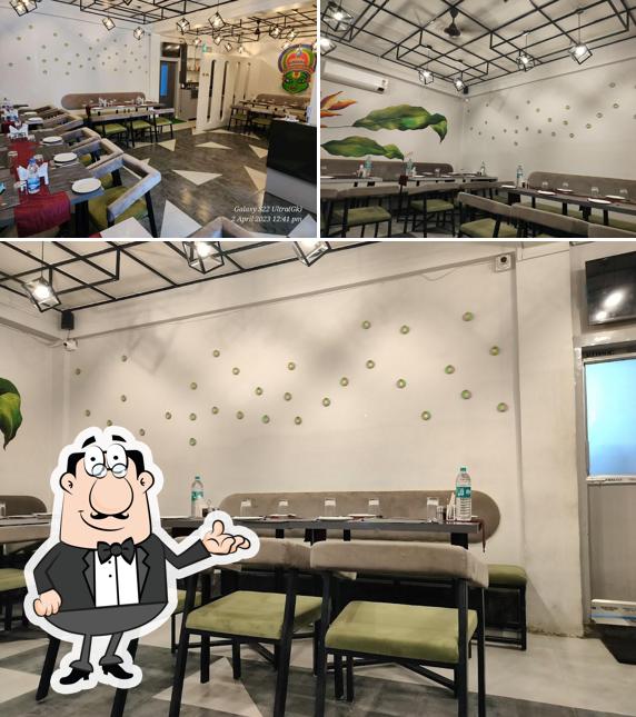 This is the image displaying interior and beverage at Desi Swaad Nagaon