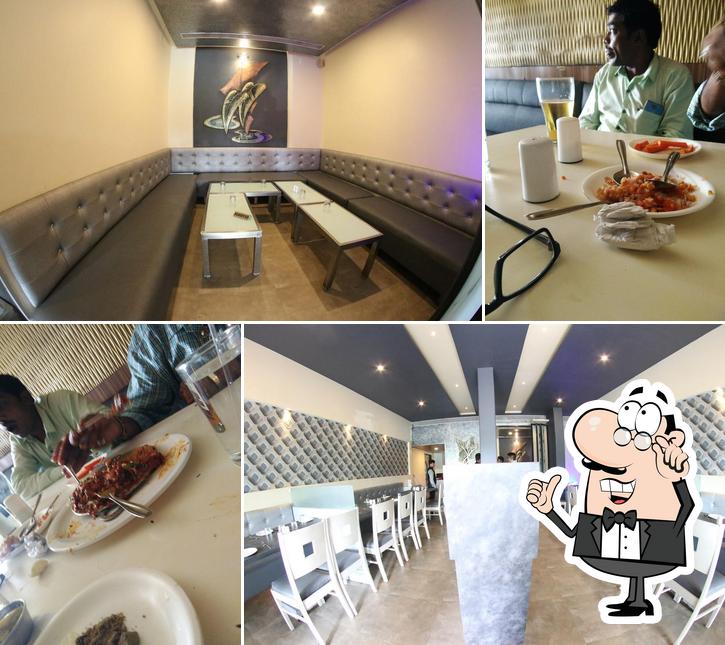 The interior of Sandesh Fine Dine Restaurant