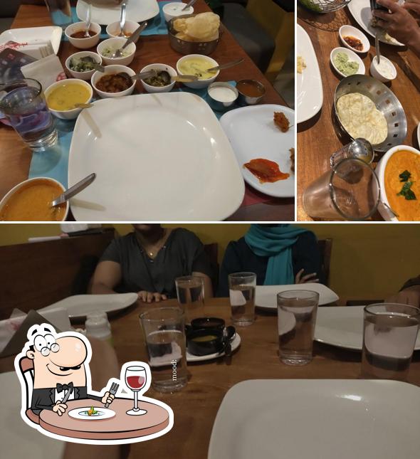 This is the picture showing food and interior at Paragon Restaurant