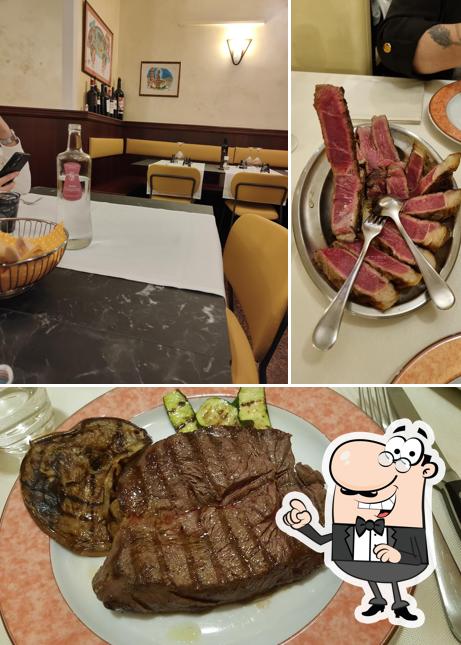 Guarda la foto che raffigura la interni e cibo di Al Fogolar di Carlo Campostrini - Ristorante