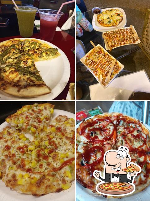 Get pizza at FORT CAFE