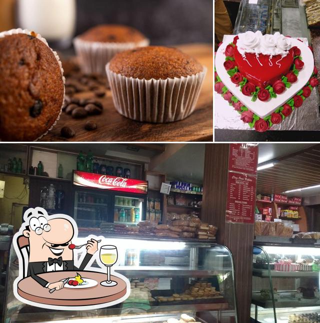 Check out the picture displaying food and exterior at Clay Oven Bakers