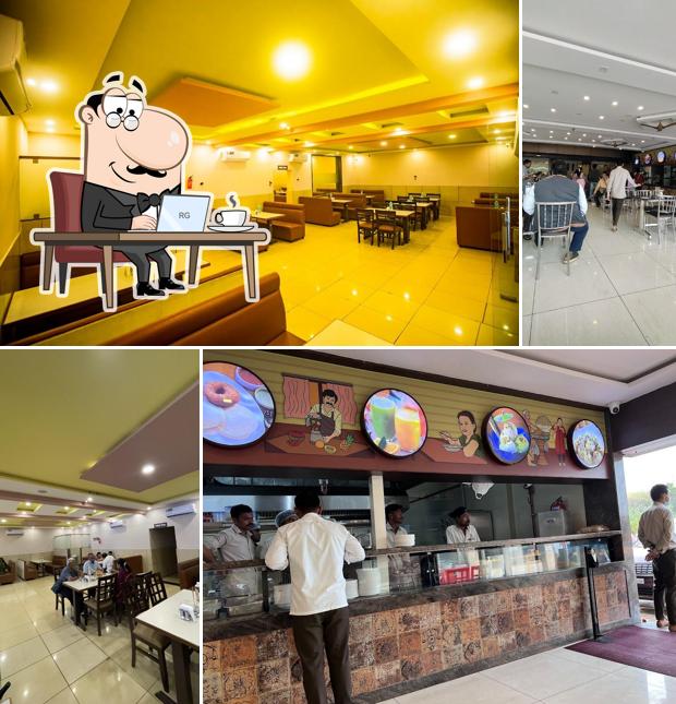 Take a seat at one of the tables at Paakashala @ Hoskote Restaurants in Old Madras Road