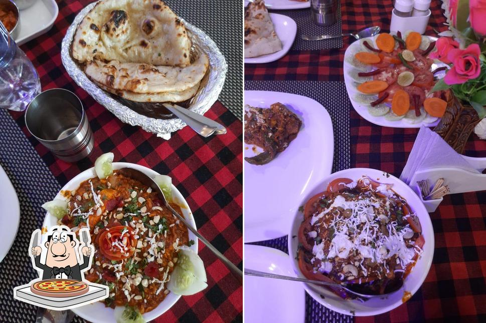 Pick pizza at Aatithey Family Restaurant