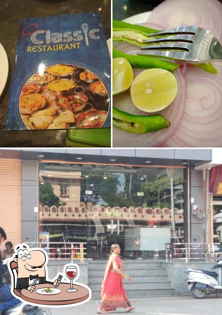 Check out the picture depicting food and exterior at Classic Restaurant
