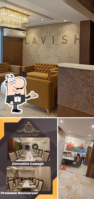 Take a seat at one of the tables at Hotel Lavish Inn