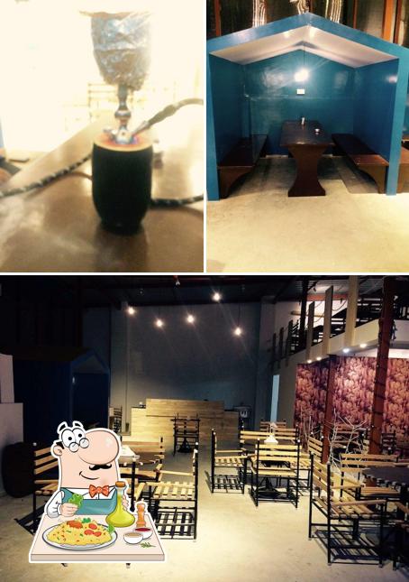 Take a look at the picture depicting food and interior at Magic House Café