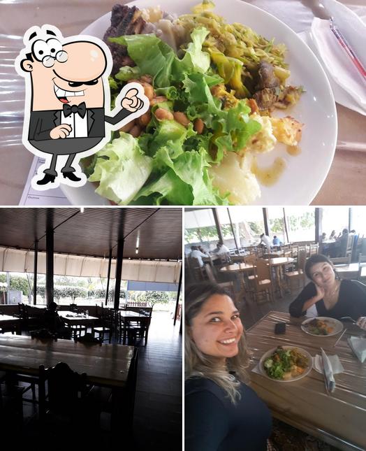 Entre diferentes coisas, interior e comida podem ser encontrados a Restaurante Fogão a Lenha