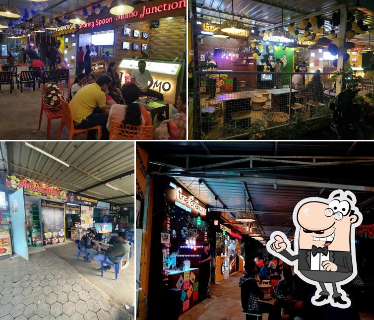 Take a seat at one of the tables at Food Headquarter