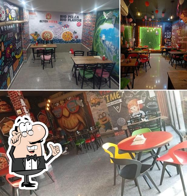 The interior of Alvin Pizza Una (CD complex near HDFC bank)