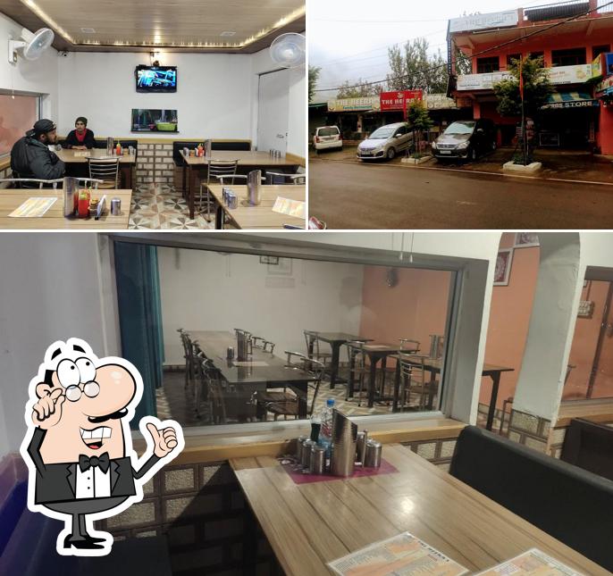 Take a seat at one of the tables at The Heera's Family Restaurant