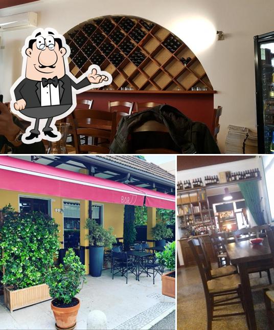 Dai un'occhiata agli interni di Osteria Bar 77