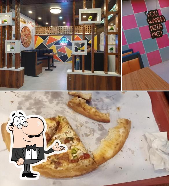 The interior of Pizza Don Mircharam Gonda