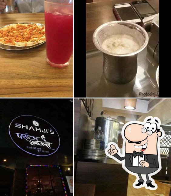 The photo of Shahji's Parantha House(Apte road)’s exterior and drink