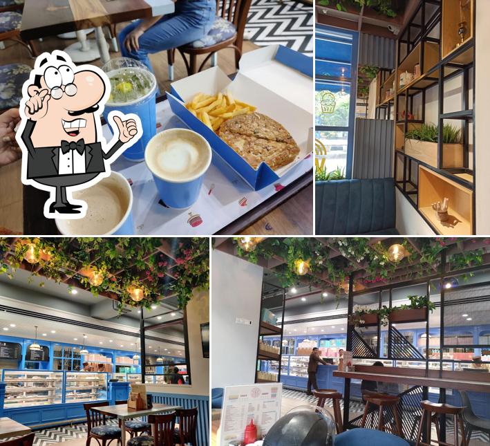 Take a seat at one of the tables at The Hazelnut Factory - Gomti Nagar