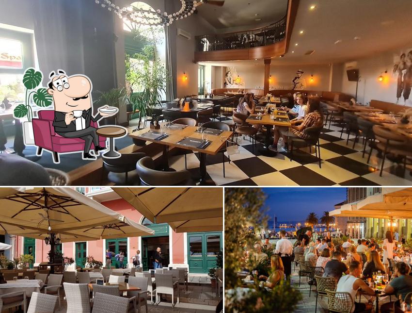 Dai un'occhiata agli interni di Bajamonti Pizza, Steak & Fish House