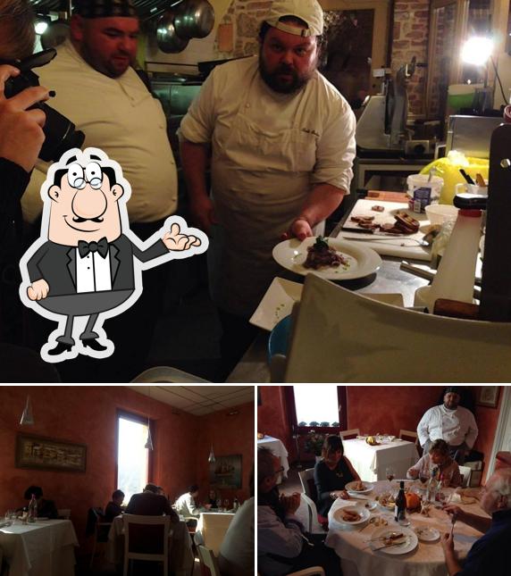 Guarda la immagine che mostra la interni e tavolo da pranzo di Garbin's Ristorante