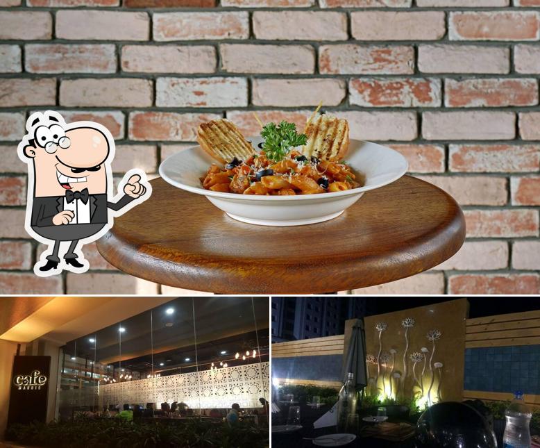 The photo of Cafe Madrid Vadodara’s interior and food