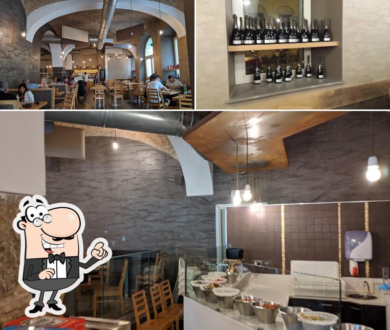 Dai un'occhiata agli interni di Pizzeria Di Napoli