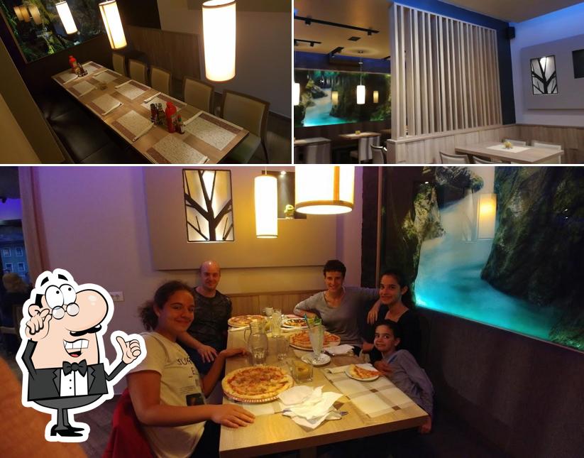 Dai un'occhiata agli interni di Pizzeria Soca 202