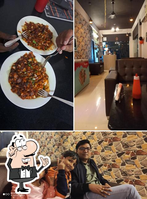 This is the picture depicting interior and food at Silent Cafe tharad