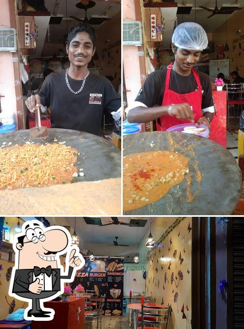 Look at the picture of Spicy cafe and Samarth Bhangar pet chats